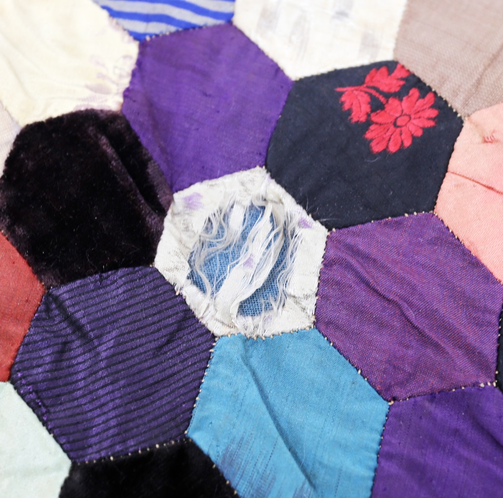 A very unusual silk quilt, c1870/80, hexagon shaped patches in a colourway of blues/gold/cream plain - Image 5 of 9