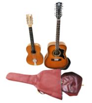 A Spanish guitar by Telesford Julve, and an E-Ros guitar in case . All wood. Some wear, loss etc.