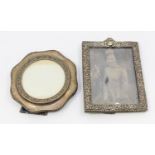 An Edwardian silver rectangular photo frame, elaborate foliage embossed design, cartouche to top