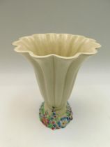 A post WWII Clarice Cliff table flower vase, 25cm tall ,chip to foot , crack to rim ,