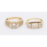 Two stone set 14ct gold dress rings, including a three stone size N and pave set ring, size N,