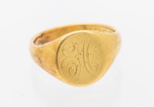 A gents 18ct gold oval signet ring, initialled. width approx 14mm, size T1/2, weight approx 11gms