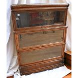 The Globe Wernick Co Ltd of London early 20th Century oak three glazed bookcase with label, in great