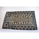An Eastern Persian late 20th Century hand knotted prayer rug, blues, blacks and greys with animal