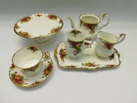A Royal Albert Old Country Roses tea service and part-dinner service , to include teapot , sugar ,
