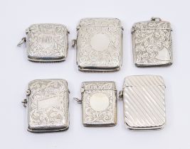 A collection of six Victorian or 20th century silver vesta cases to include; a Victorian