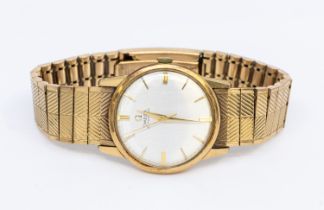 Omega- a gentleman's vintage 9ct gold cased automatic wristwatch, comprising a silvered dial with