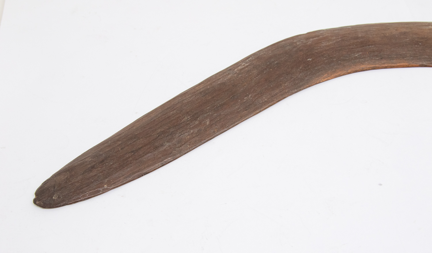 An Aboriginal boomerang, probably 19th century, simple but slight ribbed design, approx. 52cm long. - Image 2 of 2