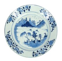 A late Kangxi 18th century Chinese blue and white charger, with chinoiserie and floral design,