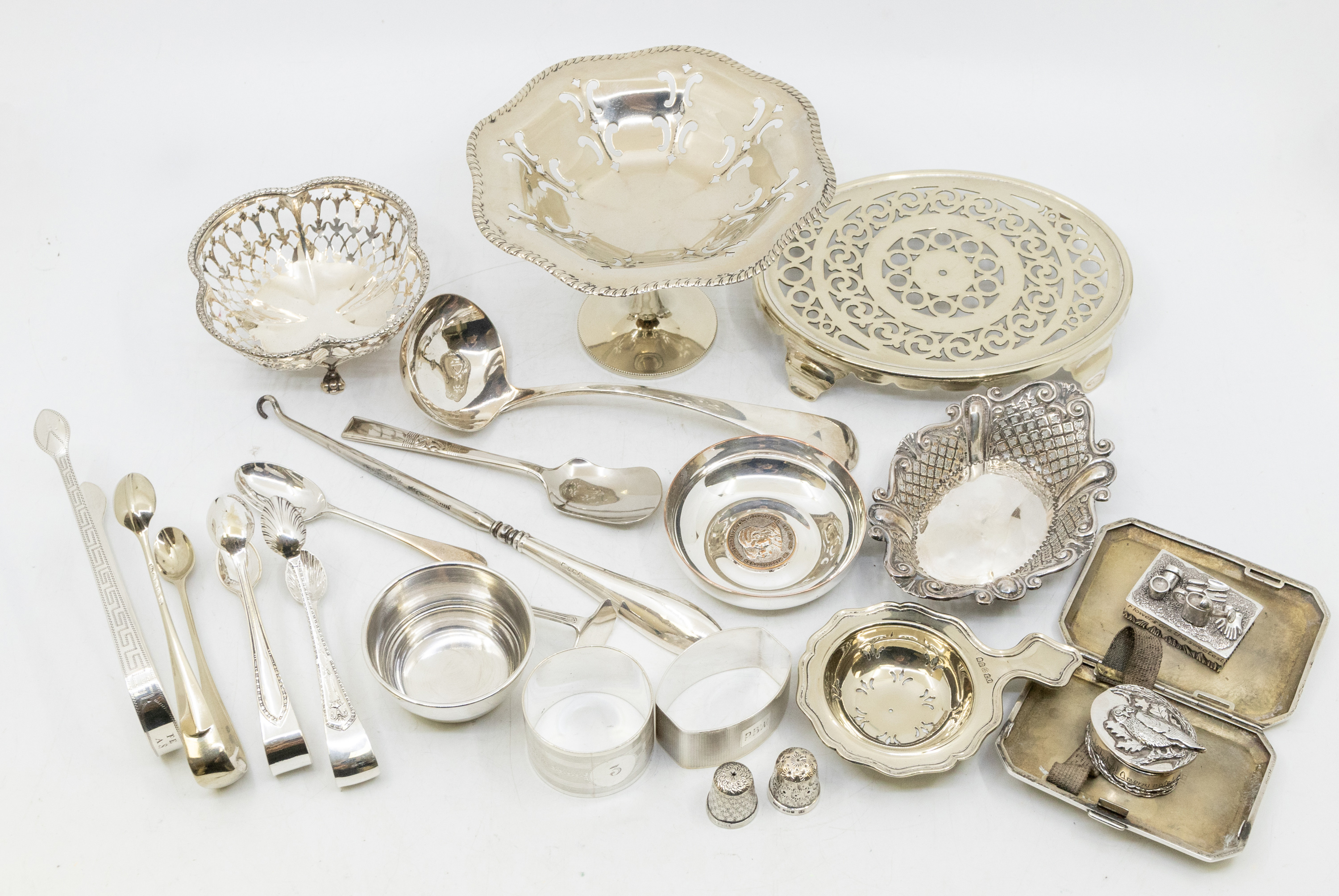 A mixed collection of silver and plated items to include; a silver sauce ladle by Horace