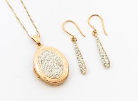 A 9ct gold crystal set oval locket suspended from a fine 9ct gold link chain, together with