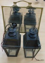 ***WITHDRAWN*** A pair of 20th century hanging lanterns with four glazed sides each and pendant