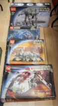 Lego: A large quantity of unboxed, unsorted Lego, within six boxes, to include Star Wars interest,