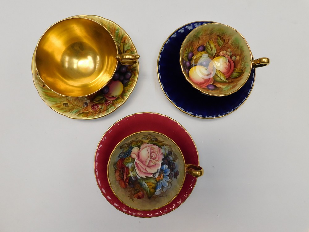 A collection of three Aynsley cabinet cups and saucers, all signed by artists, fruit design and - Image 2 of 3