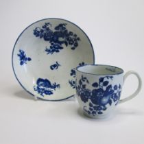 A Worcester coffee cup and saucer, fruit sprig pattern Circa 1775 Saucer diameter 12.5cm, cup height