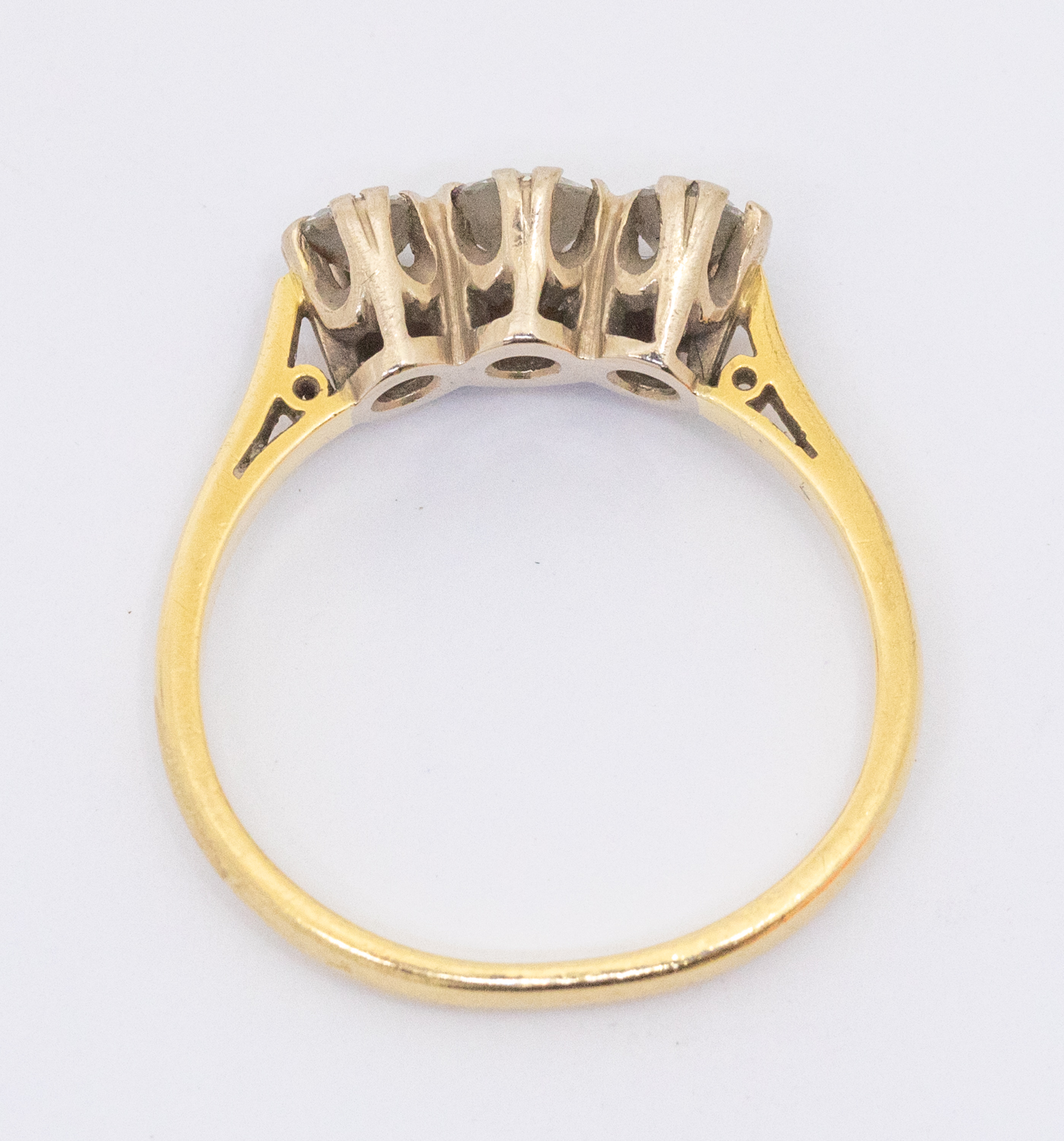 A three-stone diamond and 18ct gold ring, total diamond weight approx 0.60ct, size M, total gross - Image 2 of 2