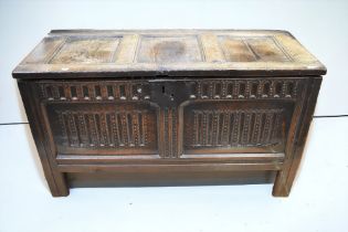 A mid 17th English solid oak coffer, originating from the West Midlands area, comprising of three