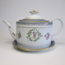 A Coalport armorial teapot with cover and stand, painted with the crest and motto for the Lock