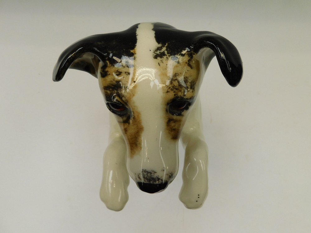 Winstanley - a 20th century ceramic model of a Jack Russell begging, glass eyes, signed to base - Image 2 of 4