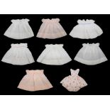 Baby dresses dating from the late 1940s/50s/60s, to include: smocked baby dresses in white and