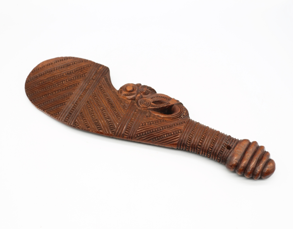 A 20th century New Zealand Maori carved "Wahaika" hand club, approx 36cm long