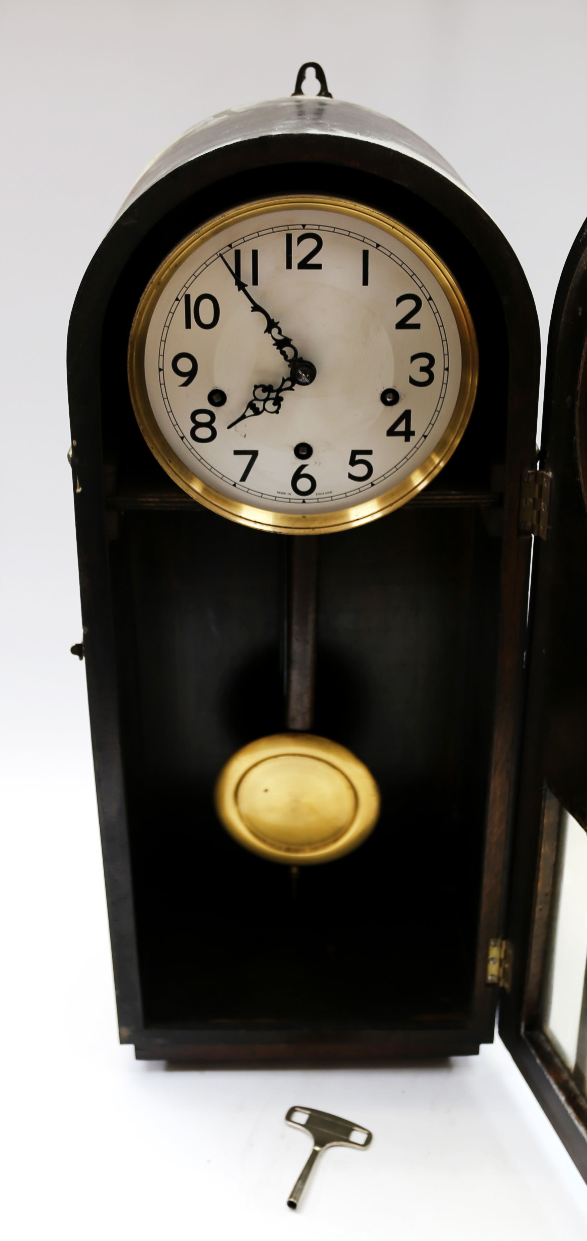 A 1930s 8 day wall clock along with three small mantle clocks. - Image 4 of 4