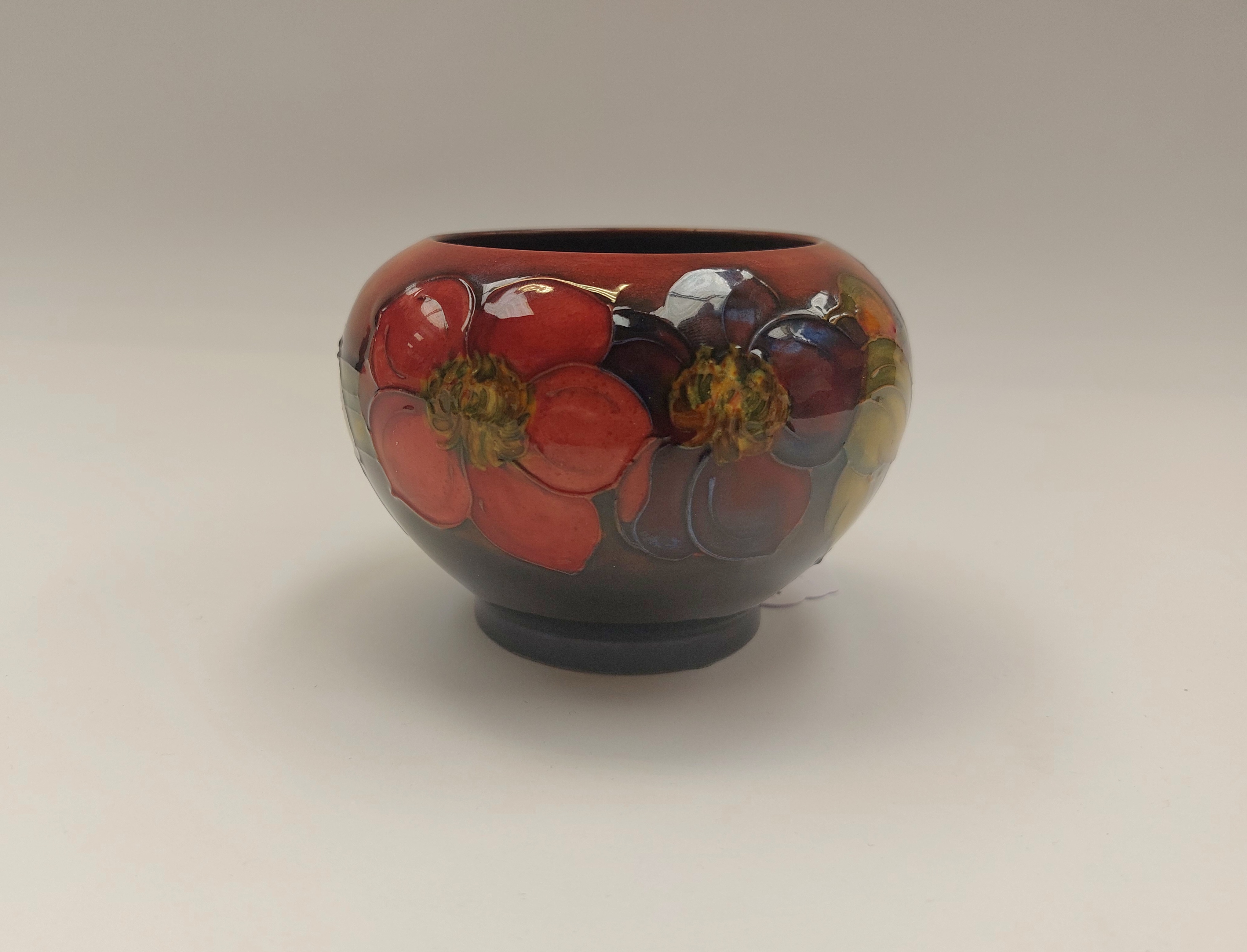 A 1950's Walter Moorcroft flambe Clematis vase , approx 3.5" tall , impressed marks to base , no