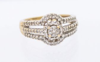 A diamond set 9ct gold dress ring, comprising small round brilliant cut diamonds, size M, total