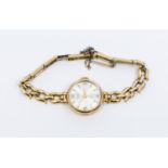 A ladies 9ct gold cased Avia wristwatch, comprising a round silvered dial with gilt baton and