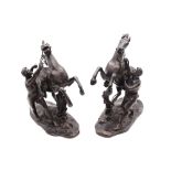 After Guillaume Coustou the Elder - a pair of patinated bronze Marly horses, bearing his signature