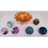 Five Caithness glass paperweights of various forms and designs an another paperweight (unmarked).