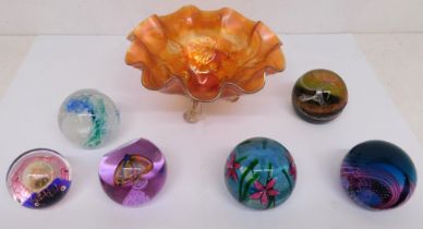 Five Caithness glass paperweights of various forms and designs an another paperweight (unmarked).