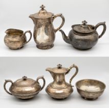 A 20th century American six piece silver tea set consisting of tea pot, coffee pot, hot water jug,