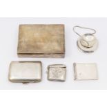 A collection of silver items to include; a small rectangular engine turned silver cigarette box,