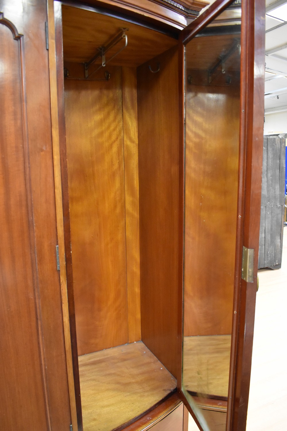 A large Victorian bow front three door mahogany wardrobe with three single base drawers. - Image 2 of 3