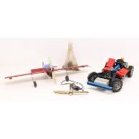 Models: A model of an airplane, together with a Lego model of a car. Along with a collection of