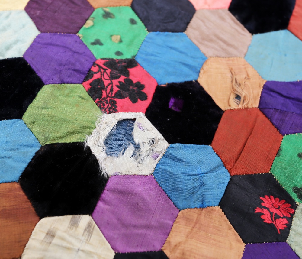 A very unusual silk quilt, c1870/80, hexagon shaped patches in a colourway of blues/gold/cream plain - Image 4 of 9