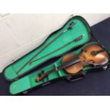 A cased 20th Century violin with two bows, Chinese manufacturer.