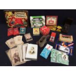 A collection of vintage boxed toys, games, playing cards, belts and a collection of early 20th