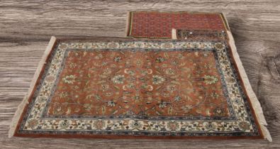 A collection of late 20th Century rugs and mats, hand knotted.