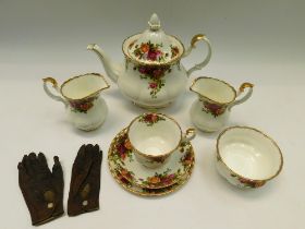 A collection of Royal Albert Old Country Roses china to include: two tea pots, twelve cups and