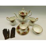 A collection of Royal Albert Old Country Roses china to include: two tea pots, twelve cups and