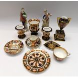 A collection of porcelain to include: Royal Crown Derby Imari 1128; Barr Flight & Barr; Coalport;