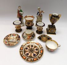 A collection of porcelain to include: Royal Crown Derby Imari 1128; Barr Flight & Barr; Coalport;