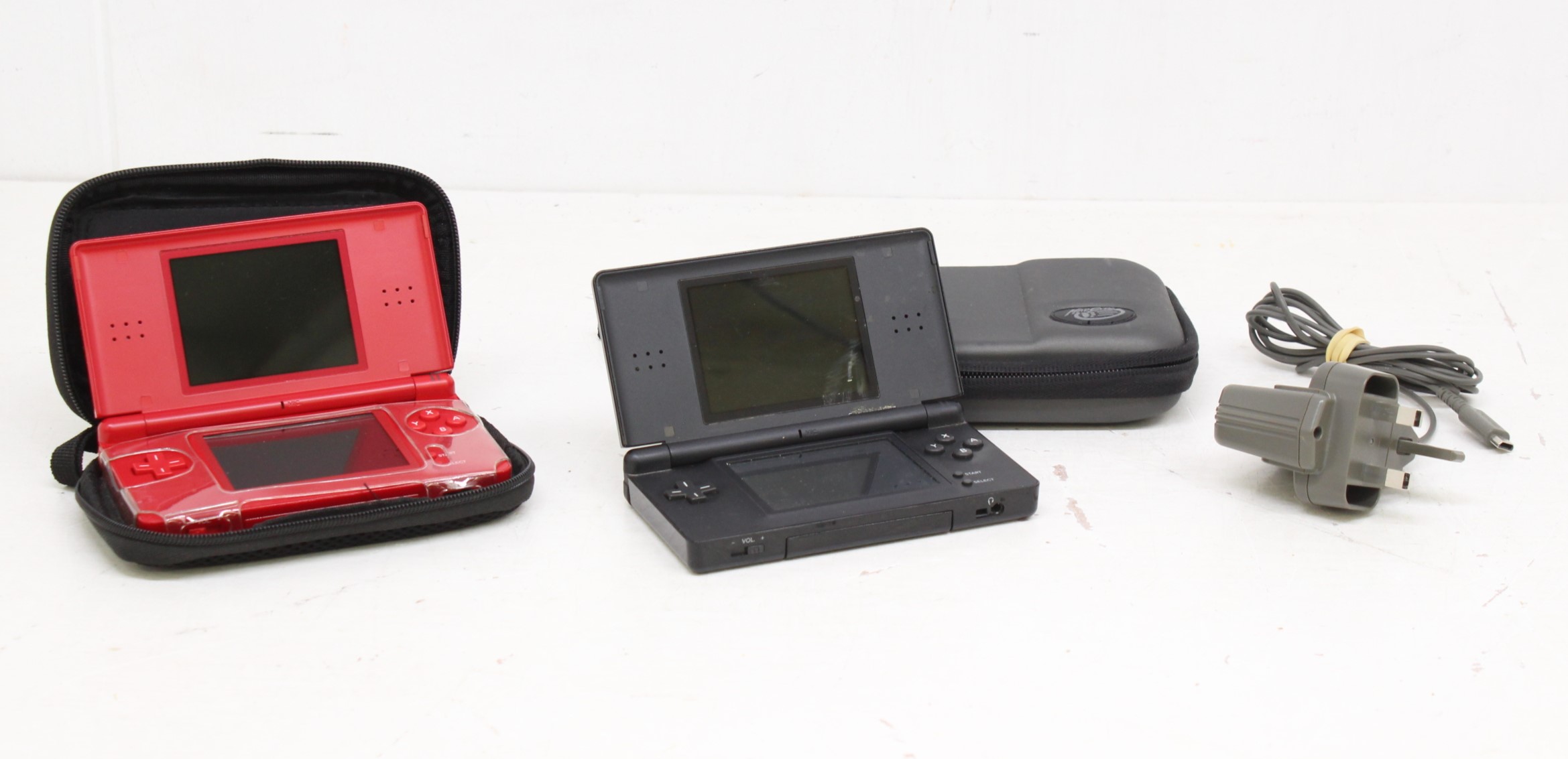 Nintendo: A pair of unboxed Nintendo DS Lite consoles; and a collection of twelve assorted cased - Image 2 of 3