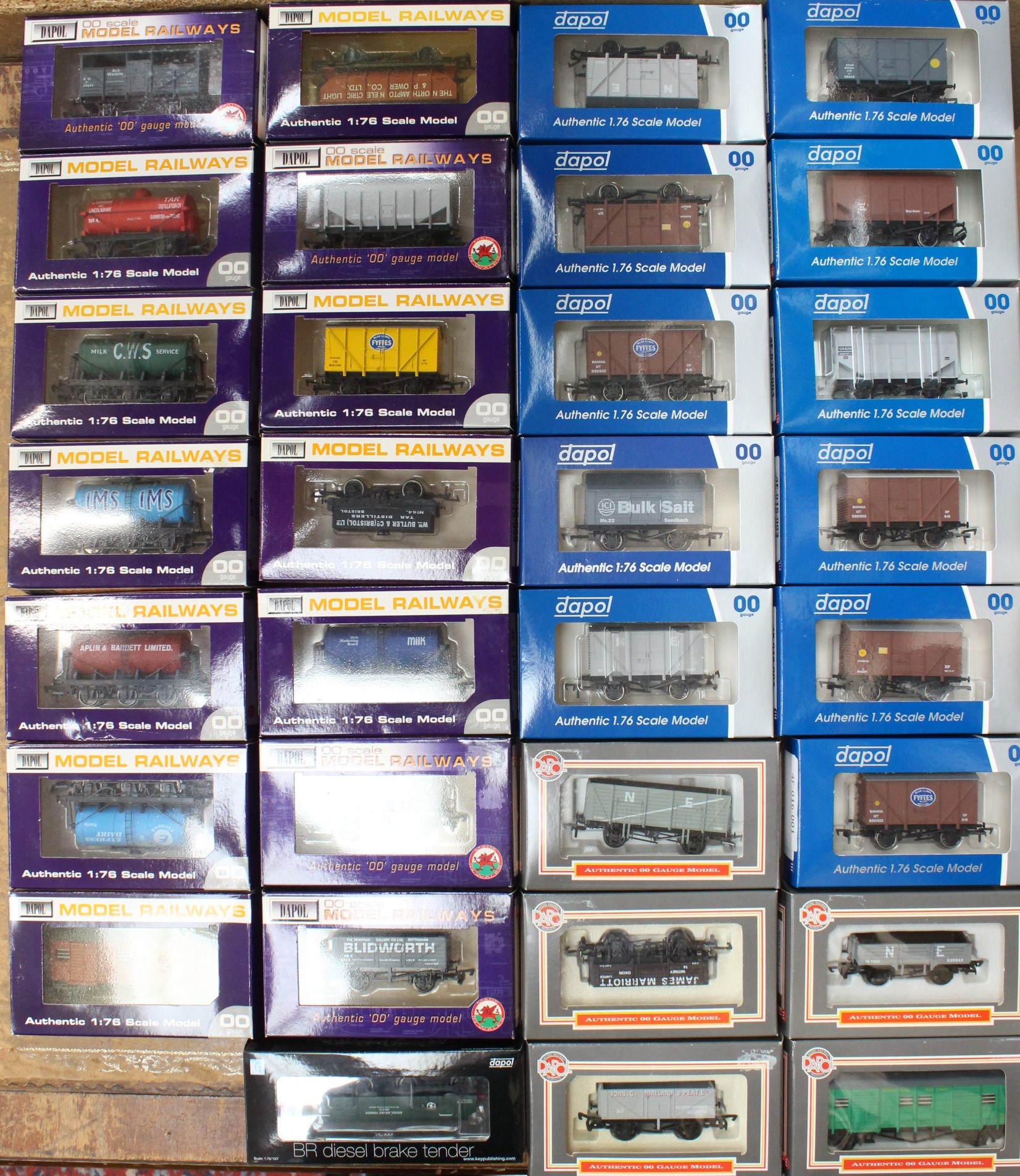 Dapol: A collection of thirty assorted boxed Dapol, OO Gauge rolling stock. General wear expected