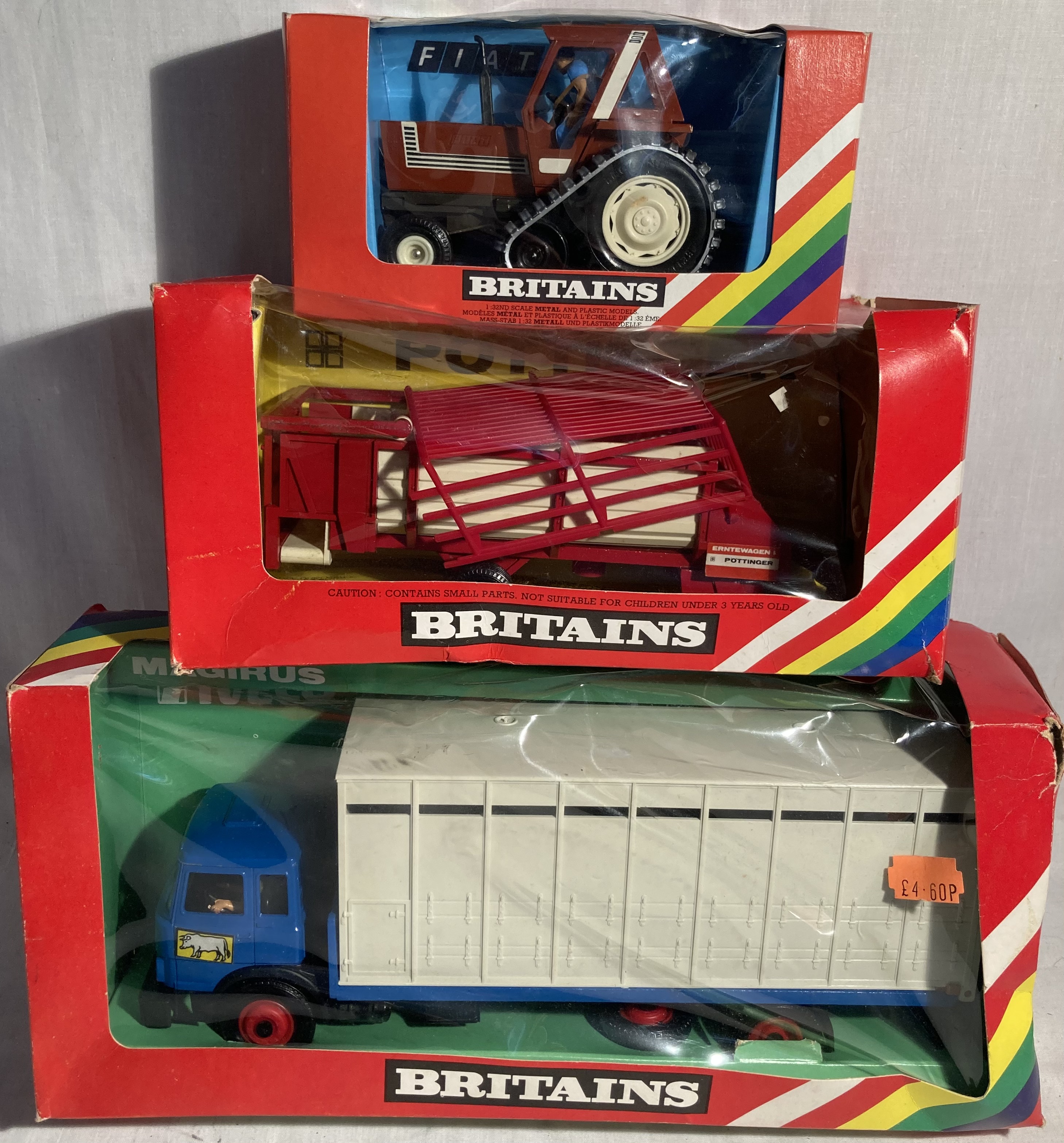 Britains: A collection of three boxed Britains Farm vehicles to include: Animal Transporter 9580,