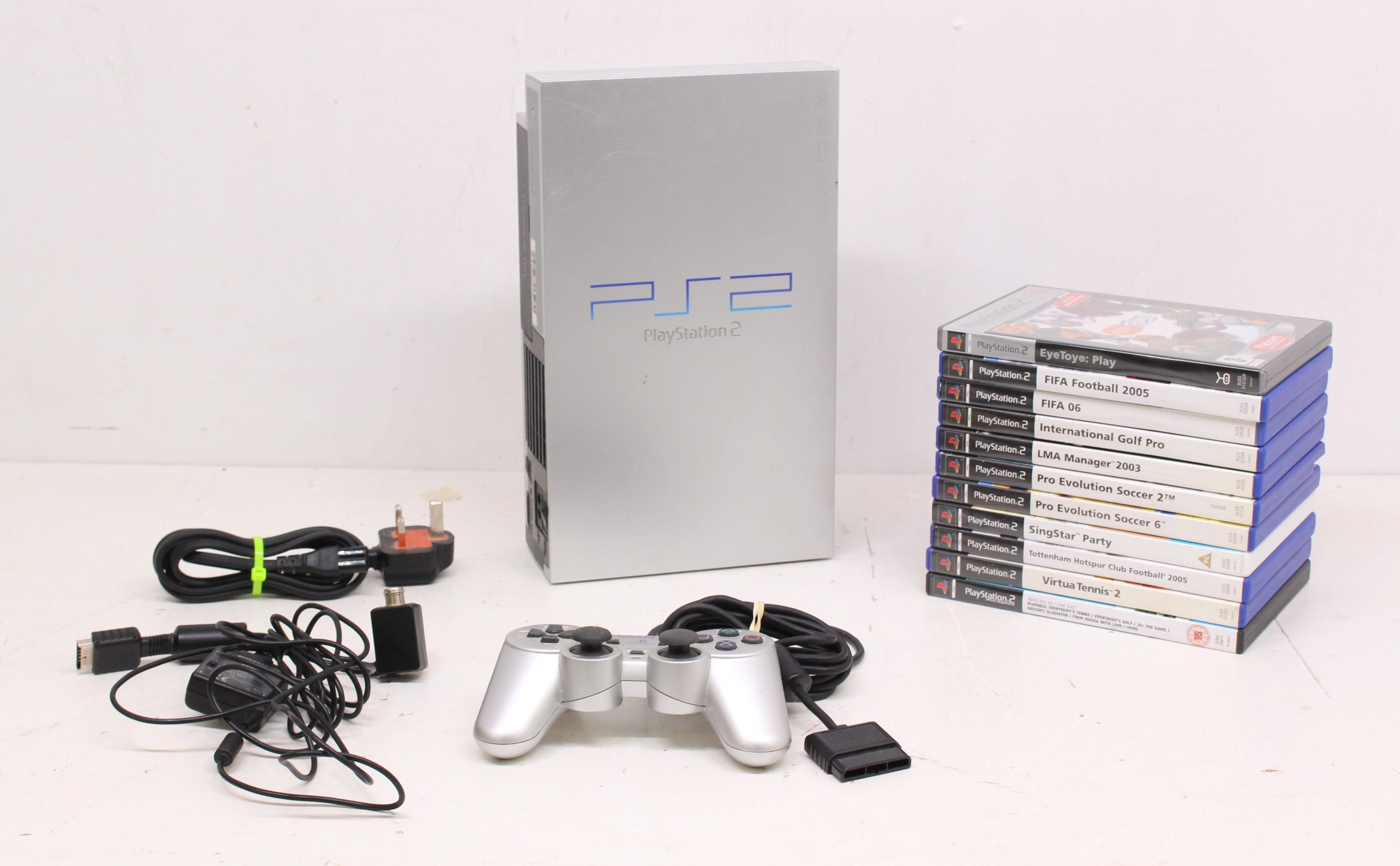 Playstation: An unboxed Sony Playstation 2 console; together with a collection of games,