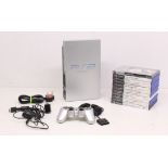 Playstation: An unboxed Sony Playstation 2 console; together with a collection of games,