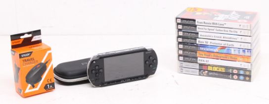 Video Games: A cased Sony PlayStation Portable (PSP) console, lacking battery and battery cover,